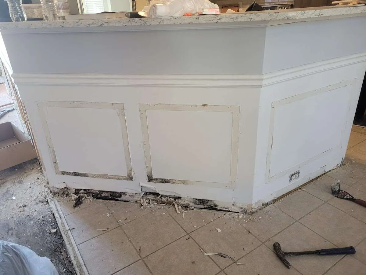Water damage and mold on kitchen during Storm Damage Restoration in Holly Springs